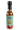 A bottle of Smokin' Ed's Mild Tamarind Mint Mango Hot Sauce, featuring a teal and red flame-themed label and black cap.