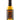A bottle of Ginger Goat Tropic Star Hot Sauce with an orange goat on the label, highlighting mango, pineapple, and scotch bonnet as key ingredients.