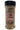 A clear plastic jar with a black lid labeled "Smokin' Ed's Sizzling Steak Seasoning 8.4" features a light brown label with black/white text, flames, and a bull’s head—ideal for fans of spicy Montreal-style steak seasoning.