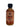 A 2 oz mini bottle of Smokin' Ed's Chipotle Express hot sauce with a black cap and a beige label with red text, logo, and flame graphics—ideal for fans of smoky hot sauce.
