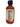 Smokin' Ed's Pepper X Special Reserve 2 oz Mini Bottle: A glass bottle with a red cap and label showing nutrition facts and ingredients. Contains reddish-orange hot sauce featuring Pepper X, with a flame graphic at the label’s bottom edge.