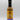 A bottle of Smokin' Ed's Currie Churri - Pepper X Edition hot sauce with an orange and blue label, flame graphics, and a circular top logo promises fiery heat from its bold spices, shown against a plain white background.
