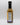 Smokin' Ed's Currie Churri - Pepper X Edition features a black-capped bottle with an intense spice blend and Pepper X heat, displaying its nutrition facts and ingredients label on the back against a plain white background.
