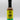 A bottle of Smokin' Ed's Jerk - Pepper X Edition, featuring a yellow and green label, black cap, lion logo, and flame graphics at the bottom, is set against a white background for a bold and spicy touch.