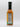 A bottle of Smokin' Ed's Moroccan - Medium hot sauce with a black cap is shown against a plain white background. The label lists nutrition facts and ingredients, and the orange-brown sauce inside highlights bold Moroccan spices.