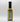 A bottle of Smokin' Ed's Mustard Dill - Pepper X Edition with a black cap and nutrition label is shown against a white background. The light brown sauce inside hints at its bold Pepper X chili flavor.