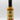 A bottle of Smokin' Ed's Shawarma - Hot sauce with a black cap. The label shows flames at the bottom, bold "Shawarma - Hot" text, garlic and chili accents, a top logo, and a 5-flame heat rating.