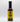 A bottle of Smokin' Ed's Spicy Malt Vinegar - Mild with a yellow label, black cap, and blue flames at the bottom, showcasing its bold blend of mild spicy malt vinegar and chili powder, set against a plain white background.