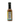 A glass bottle of Smokin' Ed's Table - Mild hot sauce, filled with brown sauce, features a black cap, chile pepper illustration, yellow and green label edges, and a back label with nutrition facts and ingredients.