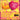 Willy Pete's Love Me Love Me Not Chocolate Bar features two heart-shaped chocolates—one yellow, one fuchsia—on a pink background. This spicy milk chocolate bar includes spicy chips, chili pepper, and sea salt for Valentine’s Day chocolate lovers.