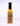 Hell's Kitchen Rockin' Rasta is a Caribbean-style hot sauce in a 5 fl oz (148 ml) bottle, featuring vibrant yellow flavor and a colorful tropical label.