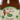 A 20 oz (624g) jar of Mama Julies Pineapple Pepper Jam with a label showing a smiling pepper, palm trees, and sandy background—a deliciously spicy jam ideal for hot sauce lovers.