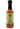 A bottle of Smokin' Ed's Thai Coconut - Hot, featuring orange spicy sauce inside, a black cap, and a light green label with flames and "Hot" text.