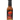 A bottle of Jersey Barnfire Ultra Hot Black Garlic hot sauce with a black cap, red barn logo, and bold flavor from extra hot 7-Pot Primos peppers—perfect as a hot sauce or unique steak sauce.