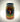A 16 oz jar of Mikey V's XXX Spicy Reaper Pickles, featuring a chili pepper and Texas logo with flames on the label. Made with Carolina Reaper peppers, these pickles pack extra heat.
