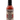 A bottle of Reaper Racha hot sauce featuring a decorative skull and red roses on the label. The fiery red pepper sauce comes in a bottle with a black cap.