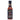 A bottle of Mikey V's Roasted Garlic Reaper hot sauce features a dark label with a red, grim reaper character and bold yellow and red text. The reddish-brown sauce inside delivers intense Carolina Reaper heat.