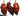 Three wrinkled, reddish-brown Chocolate Bhutlah chili peppers with green stems are shown against a white background. These superhot, irregularly shaped pods highlight the unique texture you can grow from Chocolate Bhutlah seeds.
