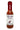 A bottle of Cooper's Small Batch Grundle Thumper hot sauce, featuring an elephant label and made with habanero, garlic, and arbol chili. This all-natural sauce is sealed with red wax.