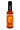 A bottle of Tears of the Sun, a vibrant habanero hot sauce with tropical fruit flavors, features a bright orange label with a stylized sun face and bold yellow and red text.