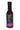 A glass bottle with a black cap and label featuring nutrition facts, purple accents, and bravadospice.com near the bottom contains Bravado Ghost Pepper & Blueberry hot sauce.