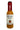 A glass bottle of Cooper's Small Batch Peaches En Regalia hot sauce features a peach illustration, orange habanero sauce inside, and is sealed with red wax for a vibrant, flavorful touch.