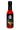 A 5 fl. oz. (148 ml) bottle of Rising Smoke Slow Death hot sauce with a black label showing an orange scorpion, cacti, crescent moon, and the product name.