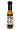 A bottle of Caribbean Reef Shark Scotch Bonnet hot sauce, featuring a bold shark illustration, a pepper, and the phrases “Born in New England” and “Eat the Heat” on the label.