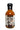 A 12 fl oz bottle of Spicy Shark Wing Sauce, featuring a fiery shark illustration on the label. This dairy-free, spicy sauce is Born in New England and dares you to Eat the Heat.