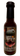 A 5 oz (148 ml) bottle of Jersey Barnfire Black Garlic Bacon hot sauce with a barn-themed label, featuring bold bacon flavor and rich umami taste—perfect for adding spicy depth to your favorite dishes.