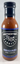 A 12 fl oz (355 mL) bottle of Brotherton's Black Iron Barbecue Sauce features a black label with white and blue text, a black cap, and is packed with spices for a unique flavor that elevates any barbecue.