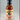 A 12 fl oz (355 ml) bottle of Mikey V's - Red Raspberry Reaper BBQ with a red and tan label showing two chili peppers, a Texas outline, and product details. This bold sauce features the heat of Carolina Reaper peppers.
