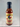 A 12 fl oz (355 mL) bottle of Mikey V's - Cherry BBQ Sauce, a Texas-style sauce labeled "Mild" and "Cherry BBQ Sauce," featuring red and green chili peppers and a Texas map on the label.